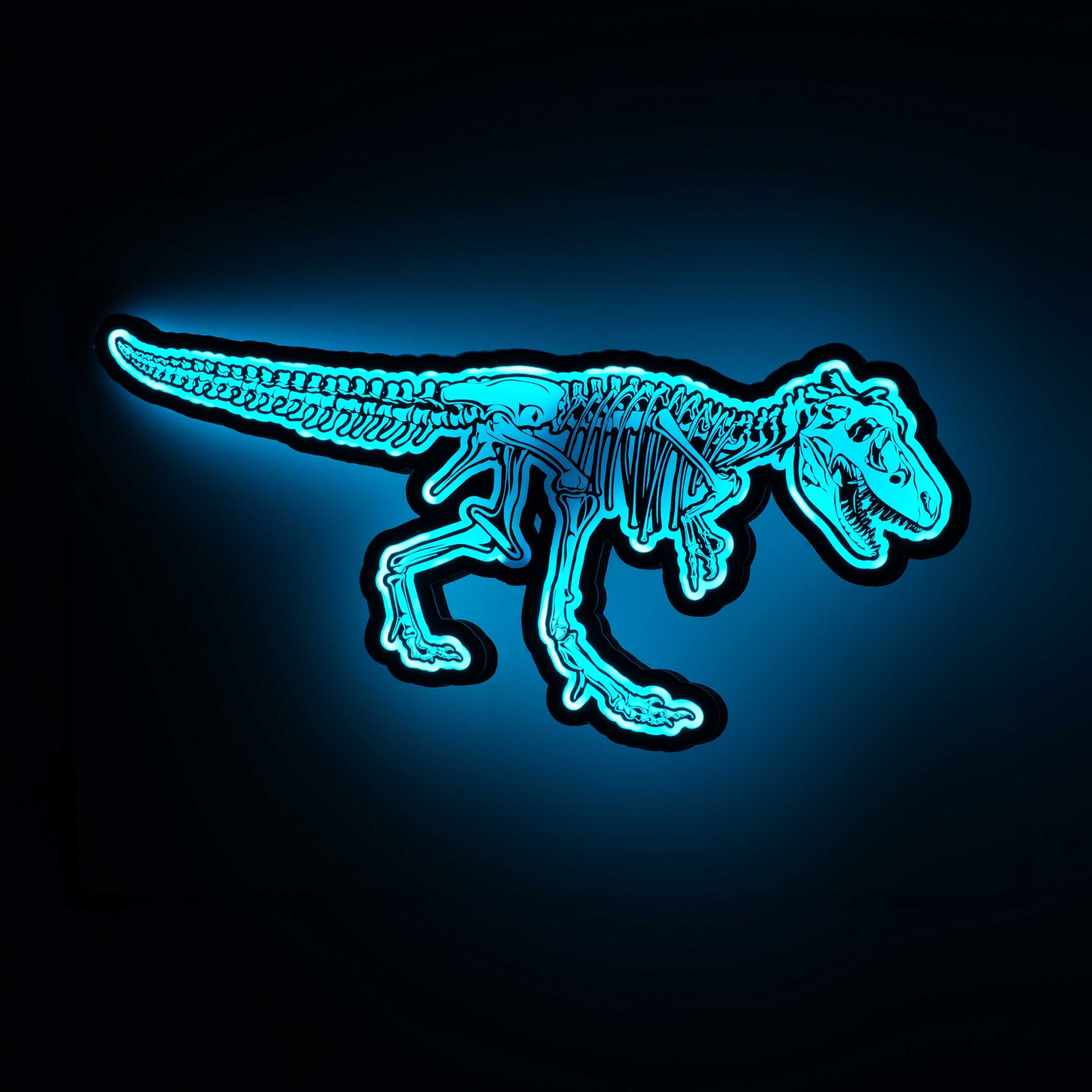 image of a 3d wall mounted acrylic light, backlit by blue led lights, featuring an epic dinosaur themed illustration of a t-rex skeleton.